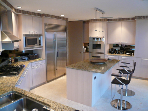 Kitchen with stainless steel appliances and an island 